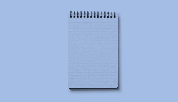 Notizblock mit hellblauem Hintergrund